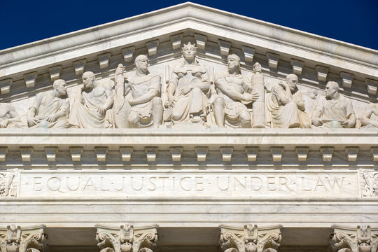 Frieze on top of Supreme Court house in Washington.