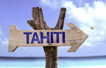 Tahiti wooden sign with a beach on background - obrazy, fototapety, plakaty
