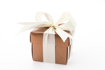 Gold gift box isolated on white background