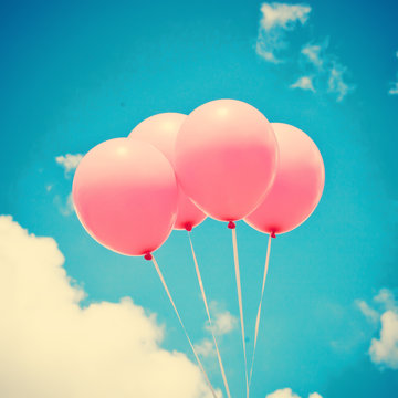 Four vintage pink balloons