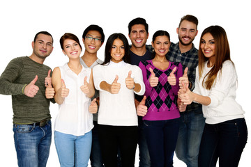 Obraz premium Cheerful group of people with thumbs up - isolated over white