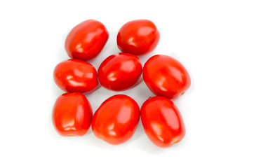 Tomatoes. Whole and a half isolated on white