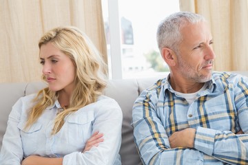 Couple arguing on the couch