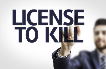 Business man pointing the text: License to Kill