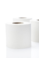 Toilet rolls against white background