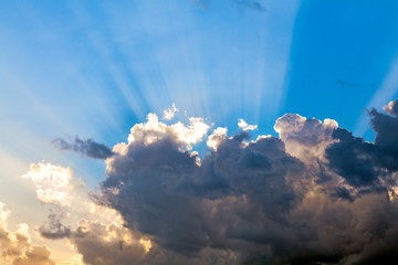 Clouds In The Blue Sky and Sun Rays