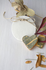 price tag label, on autumn white wooden background, hearts pumpk