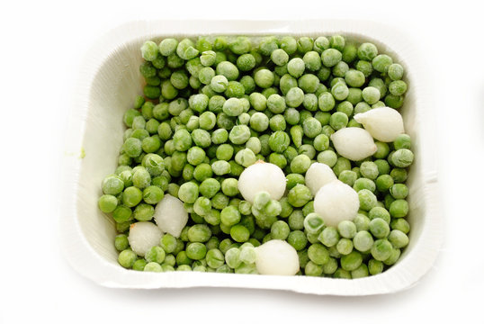 Frozen Peas and Onions in a Container