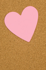 Obraz premium Pink Valentine Postit Note On Office Corkboard