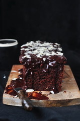 Chocolate cake with almonds, selective focus