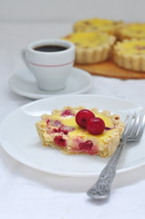 Cherry tarts with cream cheese filling, selective focus