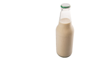 A bottle of soybean milk over white background