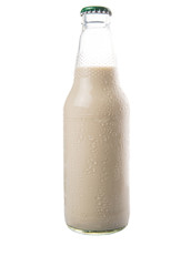 A bottle of soybean milk over white background