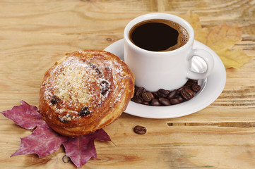 Sweet bun and coffee cup