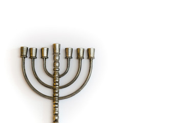 Menorah, the traditional Jewish candelabrum, on white background © NRoytman Photography