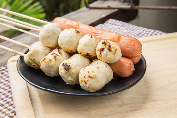 The grilled sausage and meat ball in Thai style