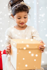 smiling little girl with gift box