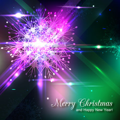 Shining christmas background with crystal snowflake and blurred