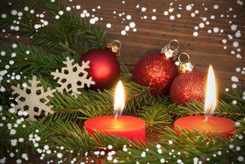 Red Burning Candles with Christmas Decoration