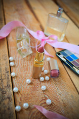 makeup accessories on wooden