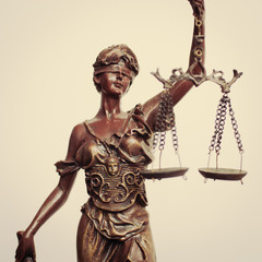 Themis goddess or lady justice holding scale blindfold