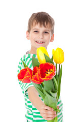 Young boy holding tulips