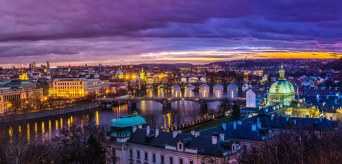 Naklejka premium Bridges in Prague over the river at sunset