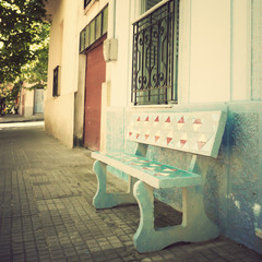 Vintage bench in a quiet street