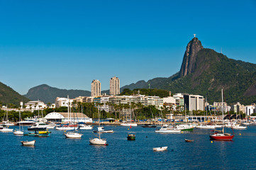 Fototapeta na wymiar Rio de Janeiro City with Christ the Redeemer and Boats