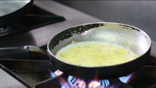 HD close up chef cooking soup in kitchen