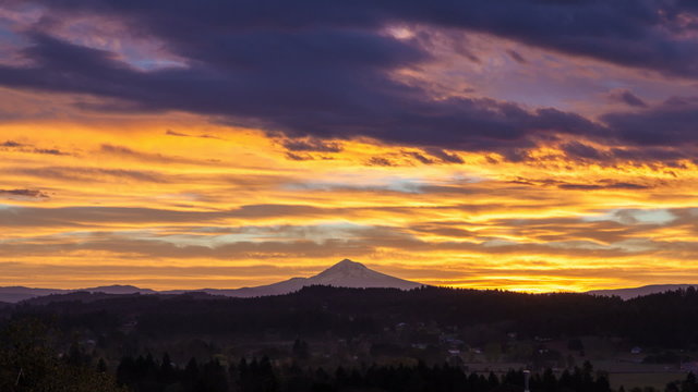 Time Lapse of Sunrise and Clouds with Mt Hood in OR Closeup