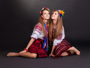 Young women in ukrainian clothes
