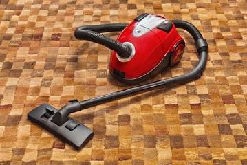 Vacuum cleaner on carpet