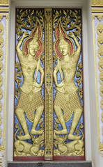 Angel decoration of buddhist temple door in phitsanulok,thailand