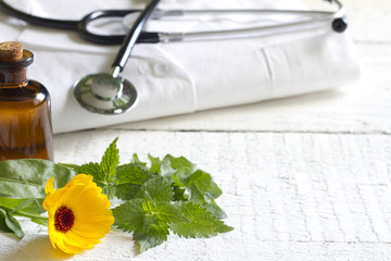 Alternative medicine herbs and stethoscope concept