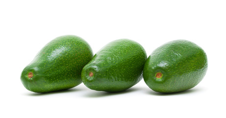 three ripe avocado isolated on white background