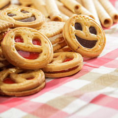 Pile of Cookies with Smiles on Table