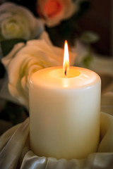 Burning Candle on Banquet Table