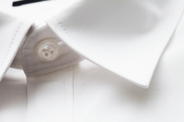 Fototapeta na wymiar Close up of white collar on shirt, studio