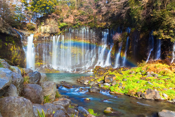 Fototapeta na wymiar Shiraito no Taki waterfall with rainbow