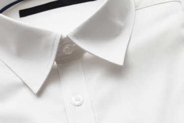 Close up of white collar on shirt, studio