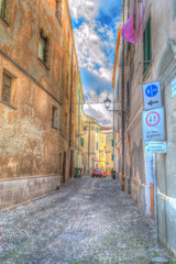 Fototapeta na wymiar street in Alghero old town on a clear day