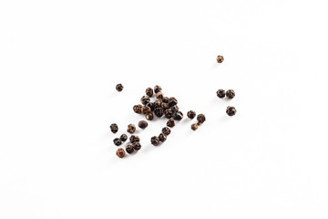 black peppers on the white