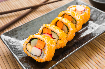 Sushi roll on plate