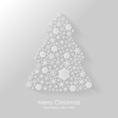 Christmas congratulatory card with fir of snowflakes