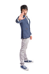 man making stop sign over white background