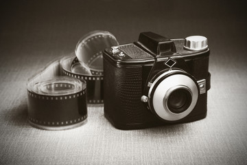 Old fashioned camera and film, studio