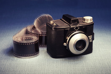 Old fashioned camera and film, studio