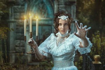 Girl with a candelabra in hand terrifies.
