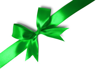 Shiny green satin ribbon on white background